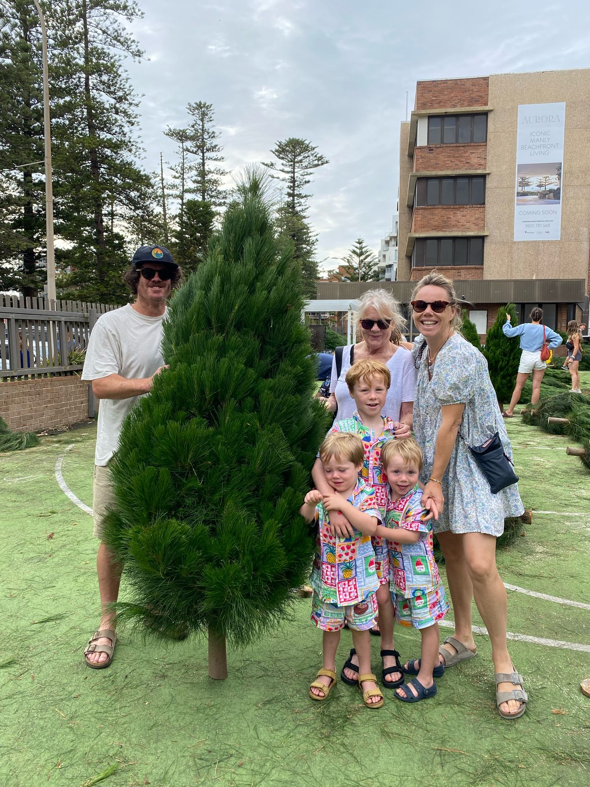 A family with their Christmas tree